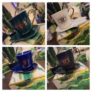 Evil eye coffee mugs with saucers